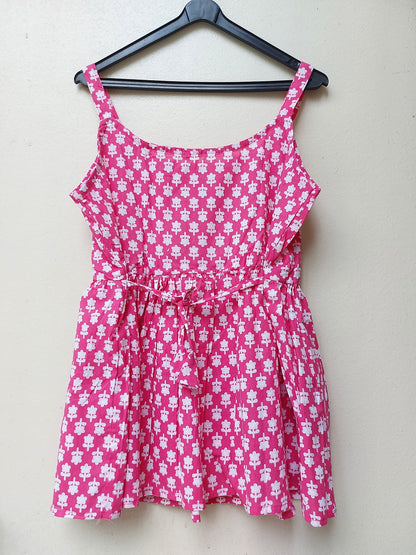 Pink Sleeveless Peplum Top